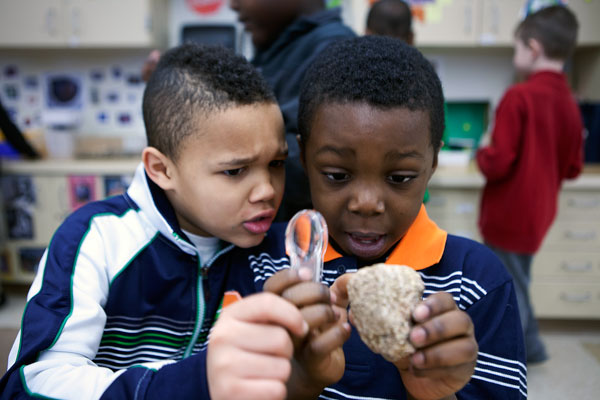 Kids examining rocks